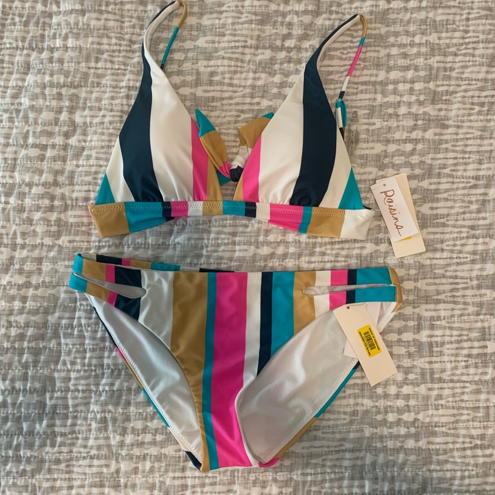 Raisins swimsuit NWT non smoking pet free home. Top is  M bottom is L